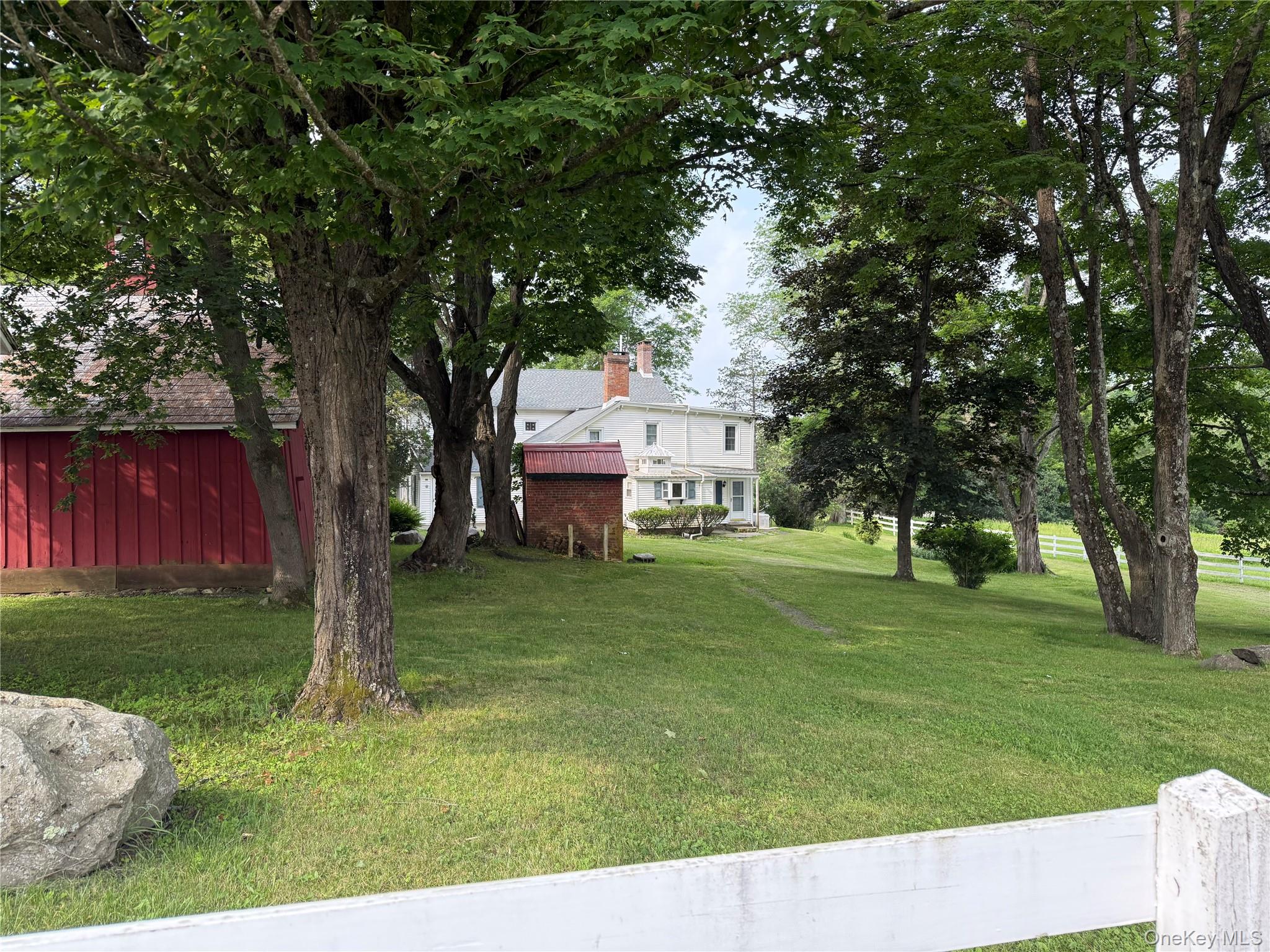 212 Cheechunk Road Goshen, NY 10924 - Photo 8 of 10 a view of a house with a yard