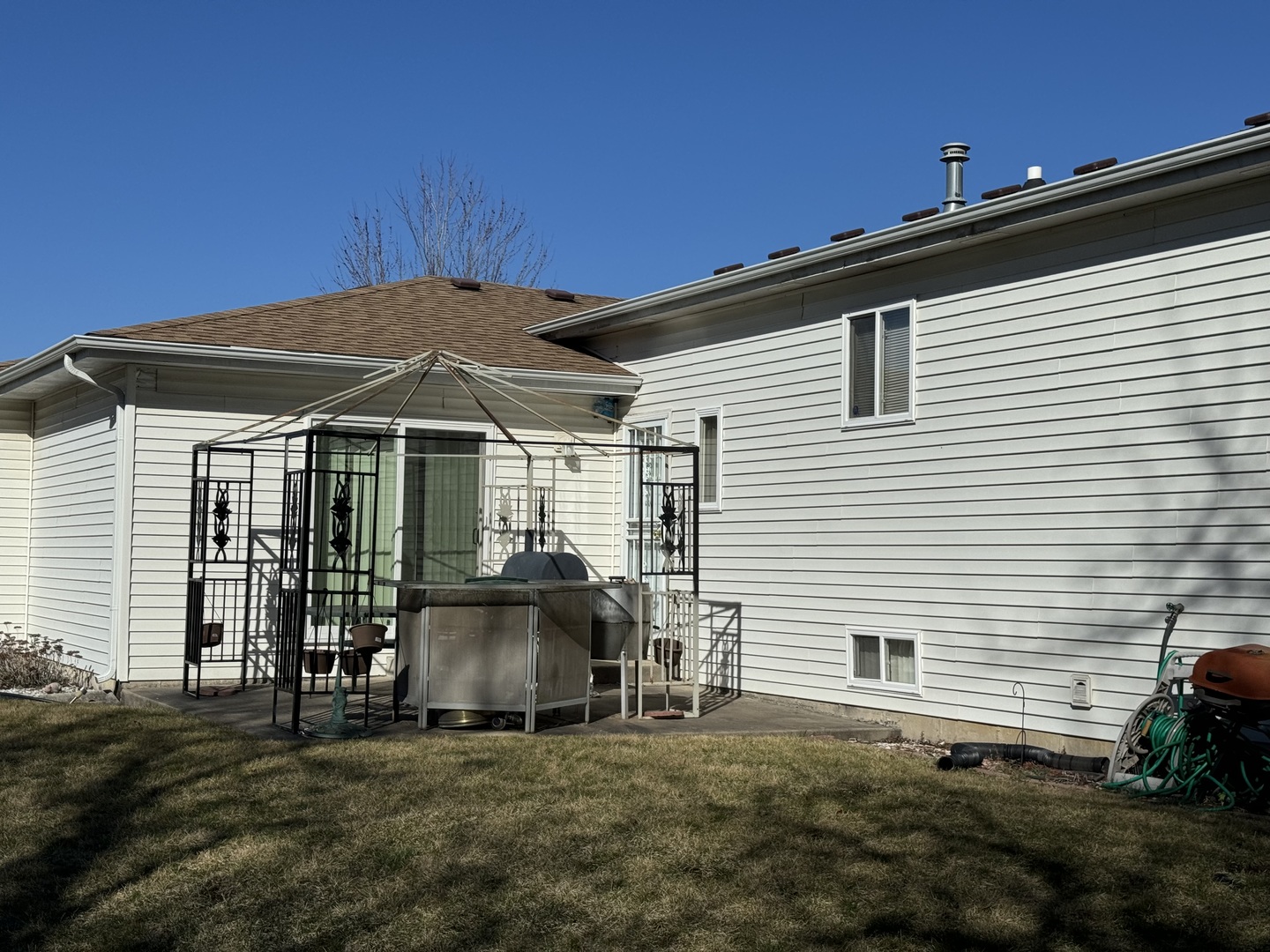 209 Churn Road Matteson, IL 60443 - Photo 11 of 26 a backyard of a house with seating space