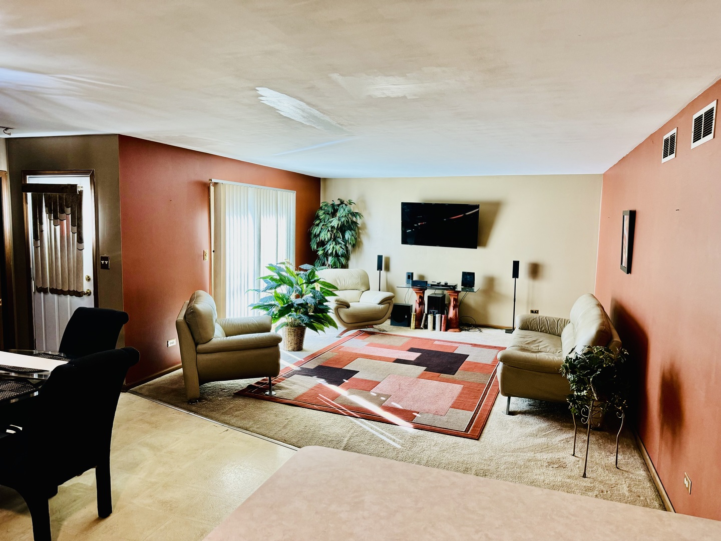 209 Churn Road Matteson, IL 60443 - Photo 21 of 26 a living room with furniture and a flat screen tv