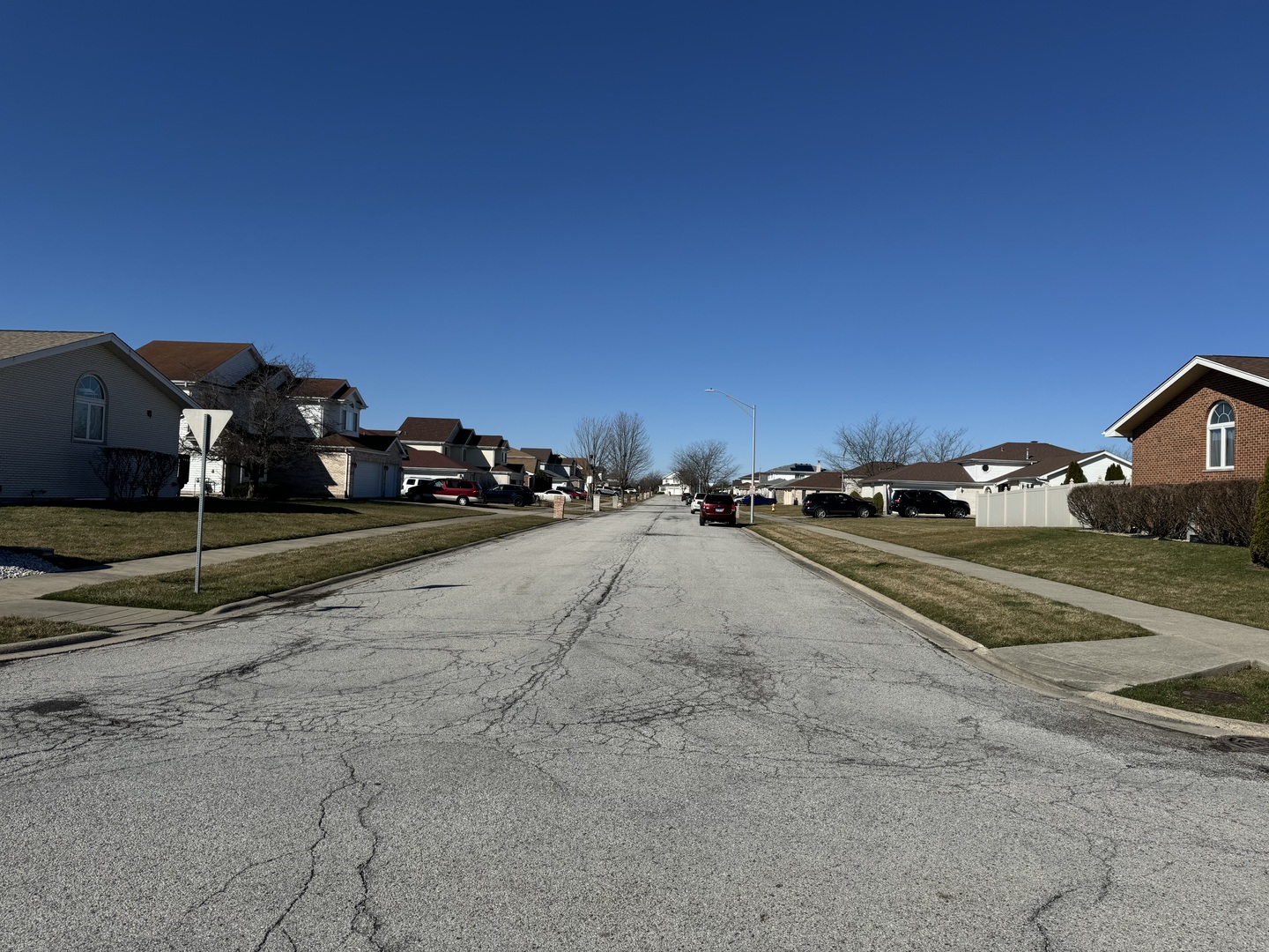 209 Churn Road Matteson, IL 60443 - Photo 5 of 26 a view of street with parked cars