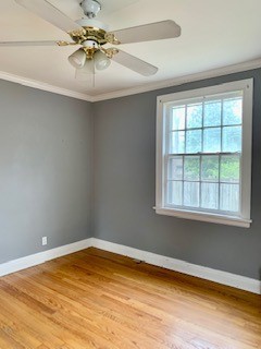 249 Lauderdale Road Nashville, TN 37205 - Photo 13 of 17 an empty room with a chandelier fan and windows