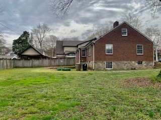249 Lauderdale Road Nashville, TN 37205 - Photo 3 of 17 a front view of a house with a yard