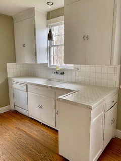 249 Lauderdale Road Nashville, TN 37205 - Photo 5 of 17 a utility room with cabinets washer and dryer