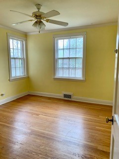 249 Lauderdale Road Nashville, TN 37205 - Photo 7 of 17 an empty room with wooden floor and windows