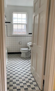 249 Lauderdale Road Nashville, TN 37205 - Photo 9 of 17 a bathroom with a toilet a window and a shower