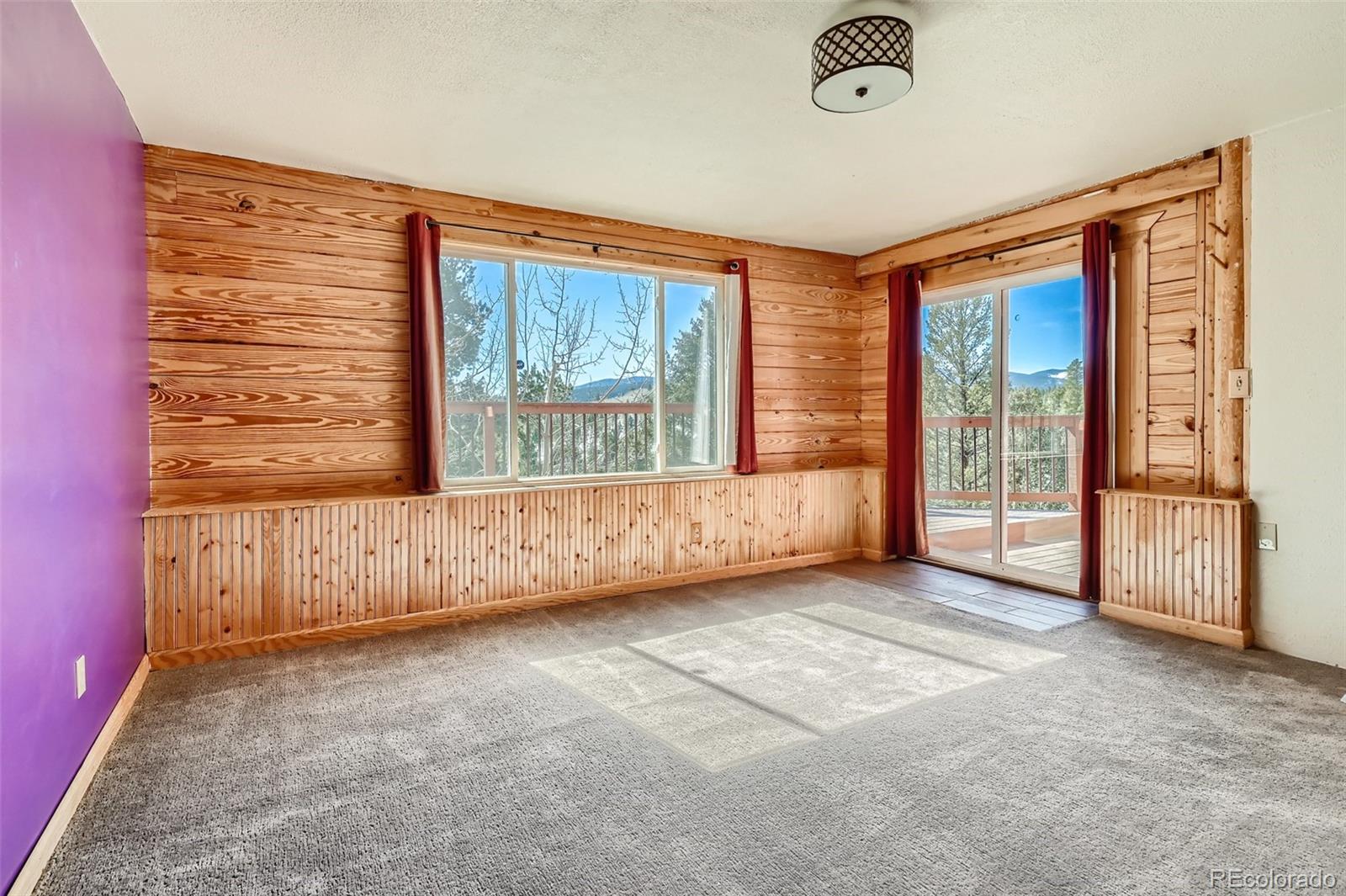740 County Road 99 Black Hawk, CO 80422 - Photo 8 of 27 an empty room with windows
