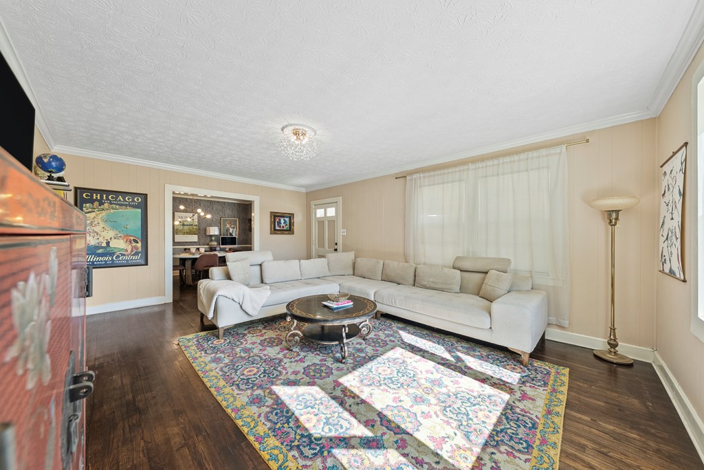 7047 Mellwood Road Columbus, GA 31904 - Photo 16 of 34 a living room with furniture and a rug