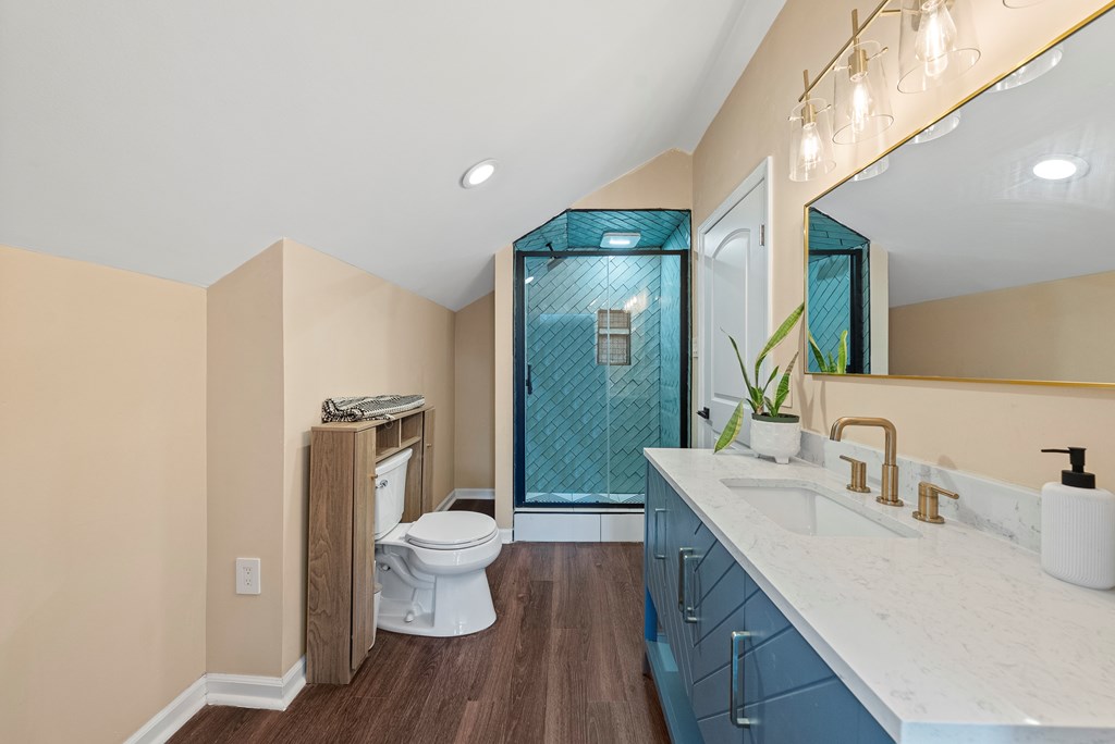 7047 Mellwood Road Columbus, GA 31904 - Photo 26 of 34 a bathroom with a double vanity sink mirror and toilet