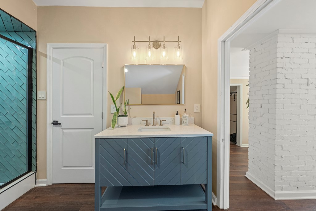 7047 Mellwood Road Columbus, GA 31904 - Photo 27 of 34 a bathroom with a sink and a mirror