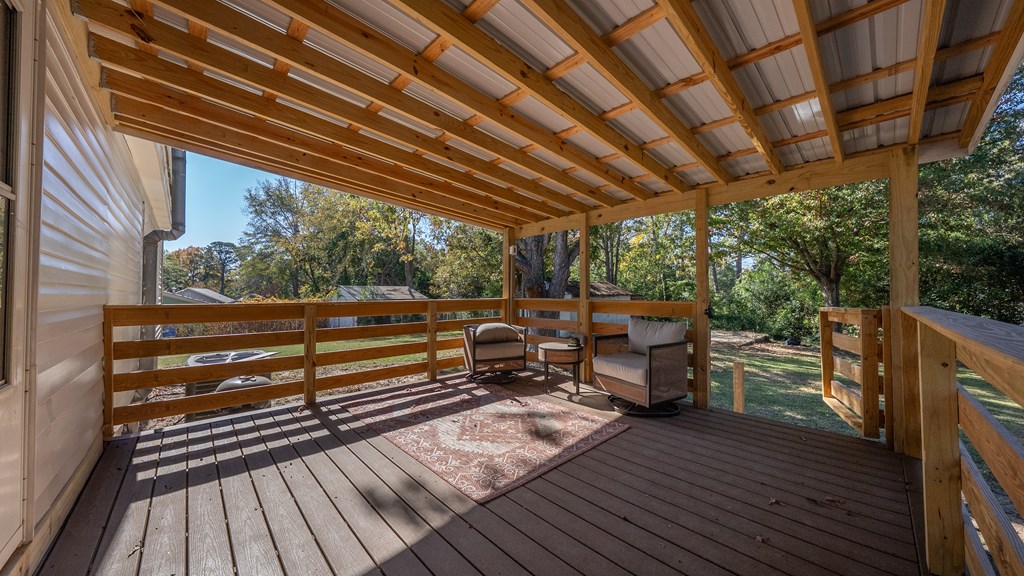 7047 Mellwood Road Columbus, GA 31904 - Photo 30 of 34 a sitting area with view of the roof