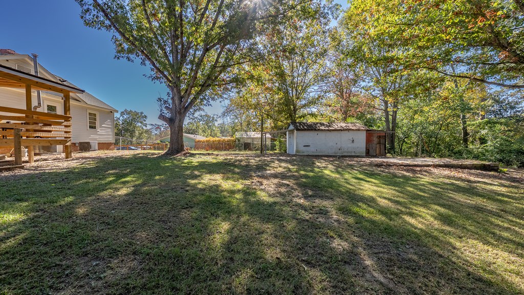 7047 Mellwood Road Columbus, GA 31904 - Photo 32 of 34 a view of a tree in front of a building
