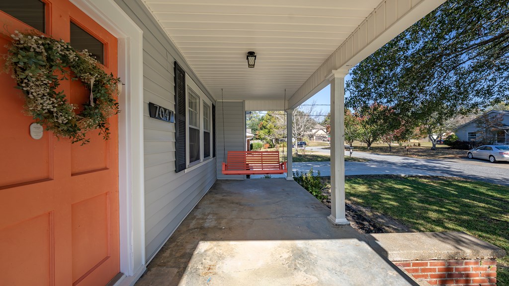 7047 Mellwood Road Columbus, GA 31904 - Photo 5 of 34 a view of a pathway of a house with a yard