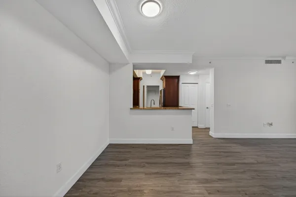 a view of livingroom with wooden floor