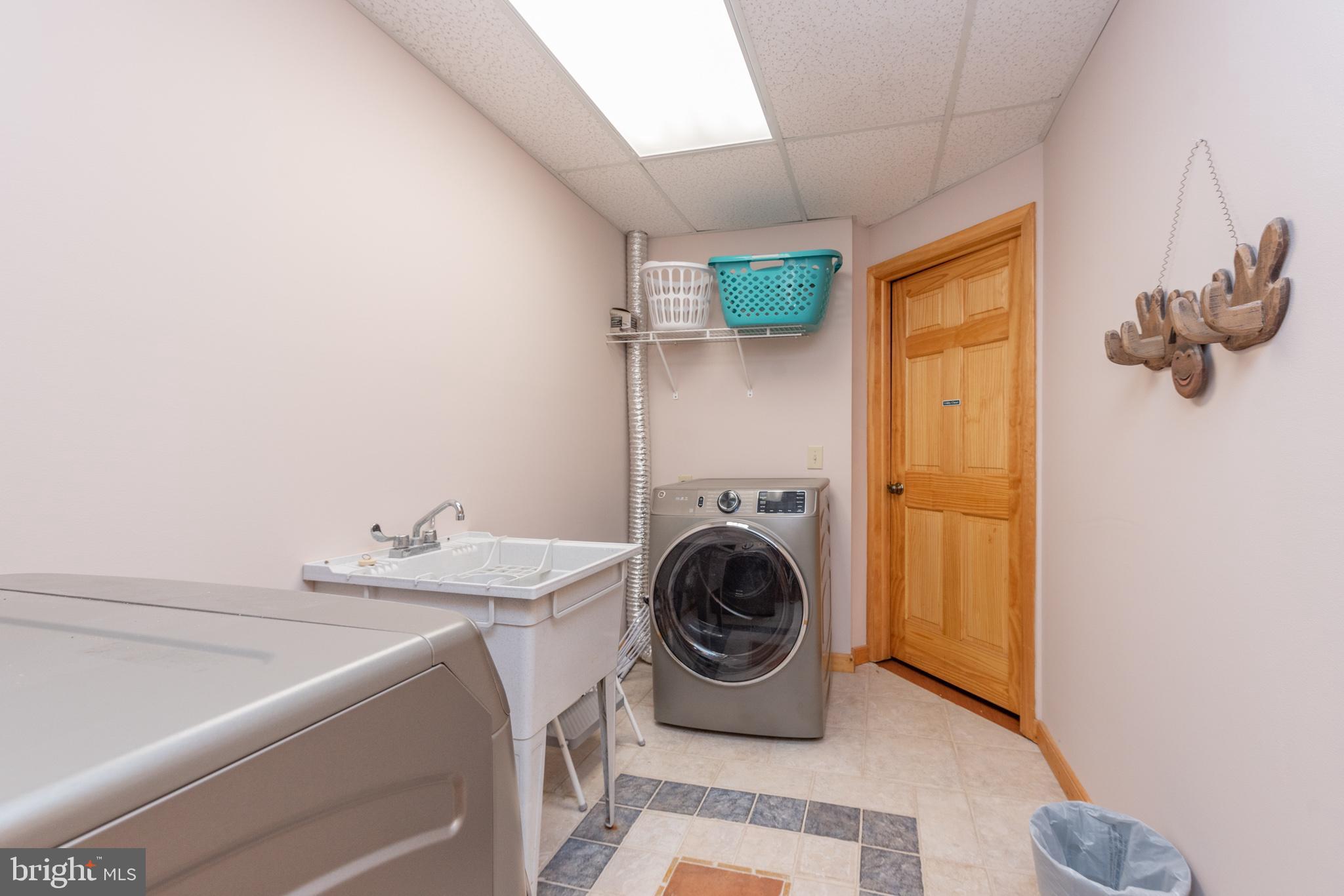 615 Sandy Shores Road Oakland, MD 21550 - Photo 77 of 103 Bright and functional laundry space.