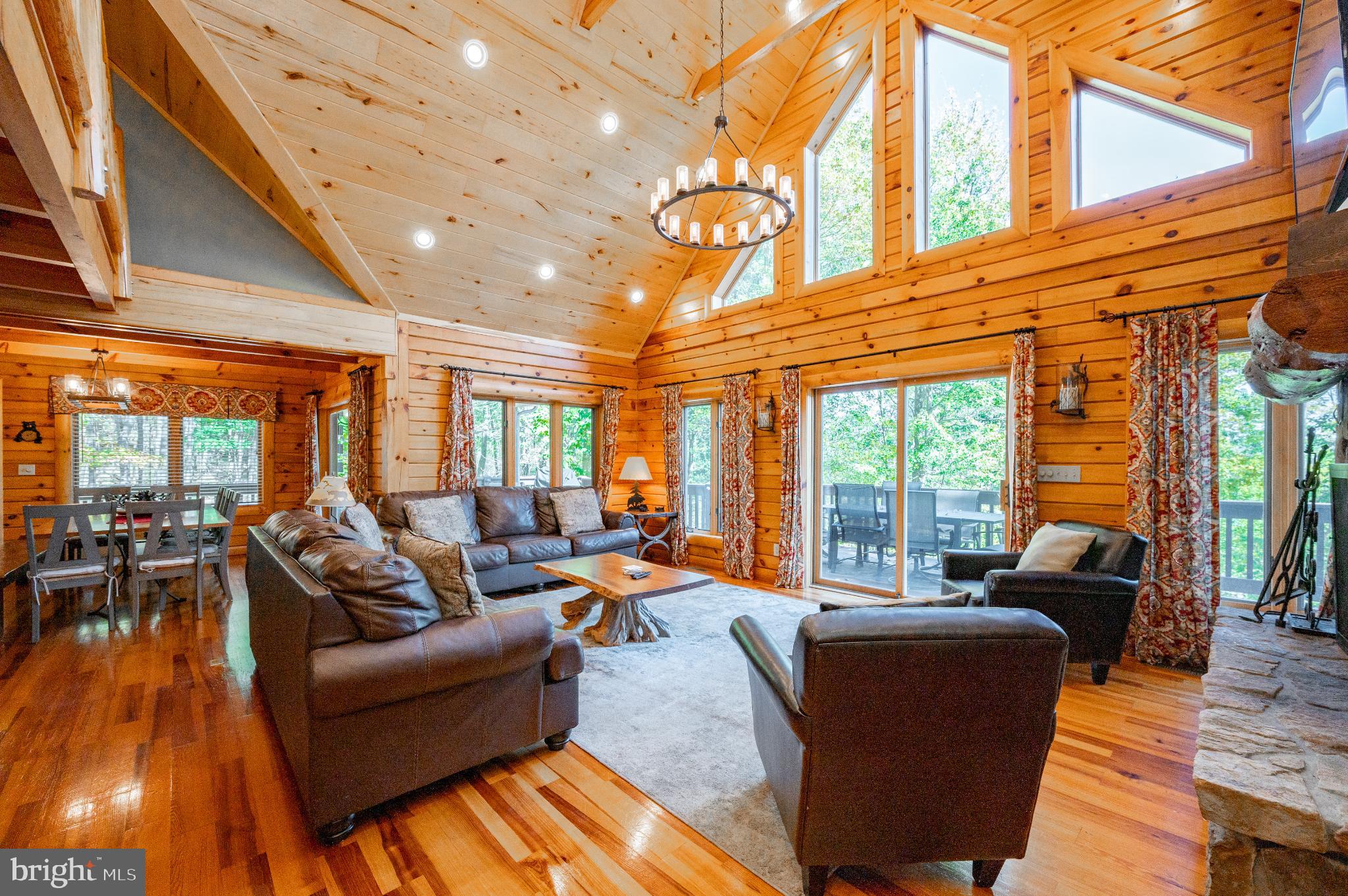 615 Sandy Shores Road Oakland, MD 21550 - Photo 9 of 103 Cozy log cabin with bright, airy spaces.