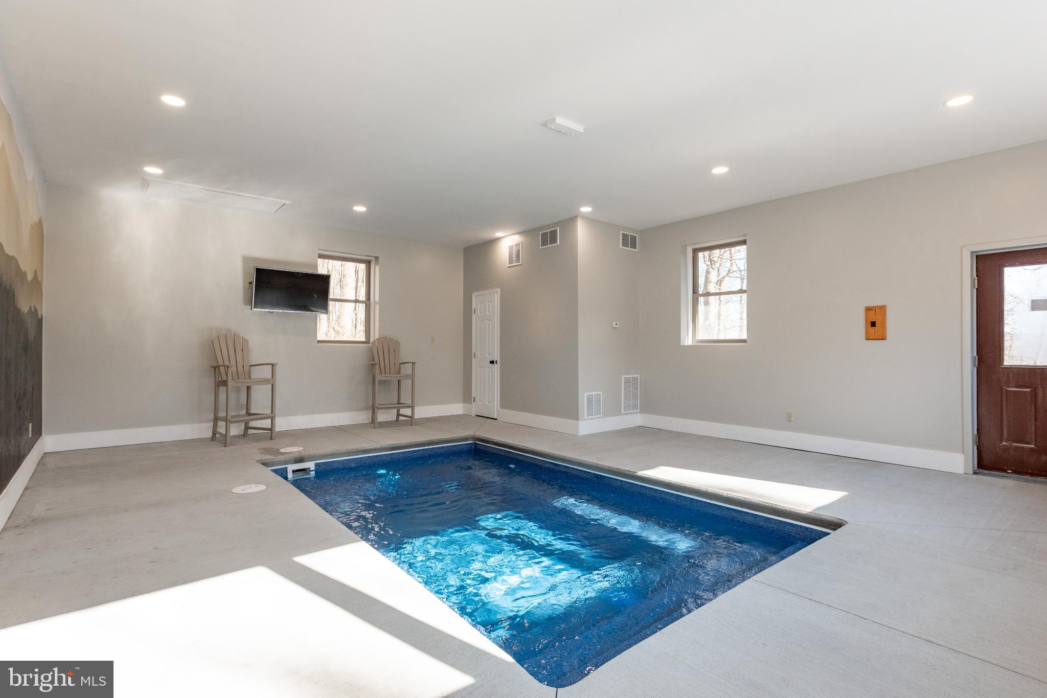 615 Sandy Shores Road Oakland, MD 21550 - Photo 91 of 103 Indoor oasis with a private pool retreat.