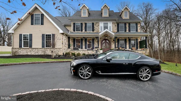 a car parked in front of a house