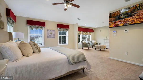 a living room with kitchen island furniture and a kitchen view