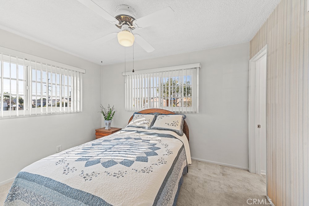 10282 Longden Street Cypress, CA 90630 - Photo 35 of 43 a bedroom with a bed and a window