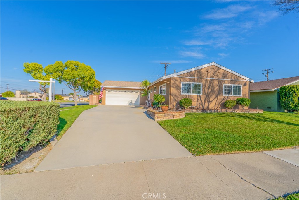 10282 Longden Street Cypress, CA 90630 - Photo 6 of 43 a view of a house with a yard