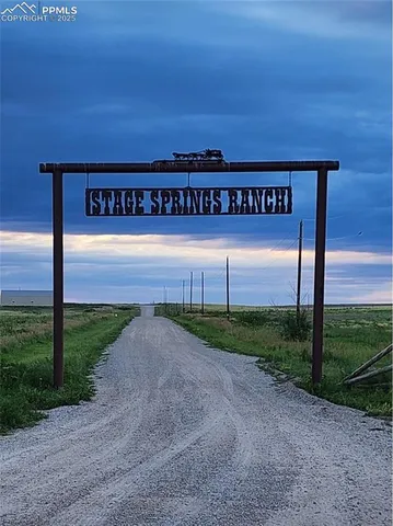 a view of a building with a big yard