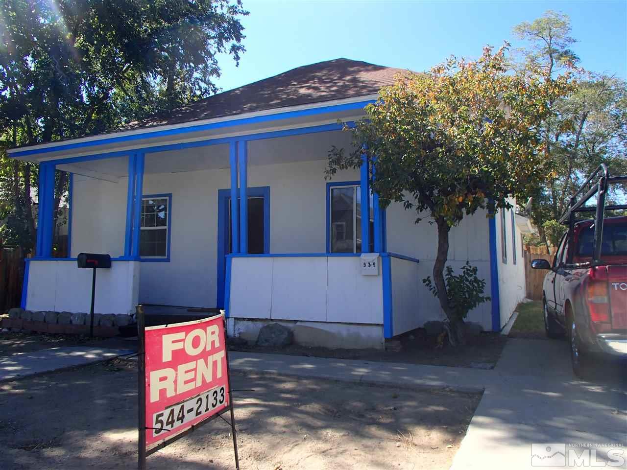 943-939 Ralston Street Reno, NV 89503 - Photo 1 of 1 a front view of a house with garden