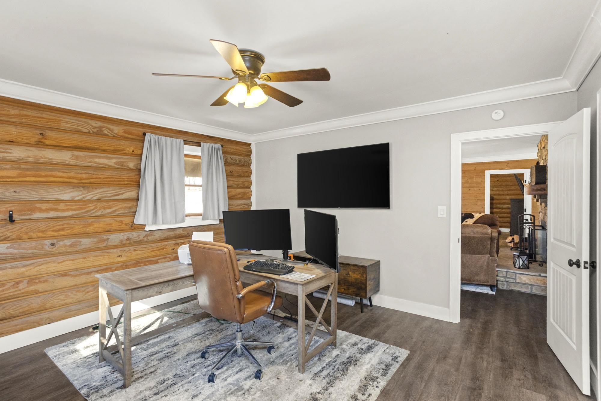 1300 Ridge Road Dickson, TN 37055 - Photo 15 of 60 a workspace with wooden floor and a window