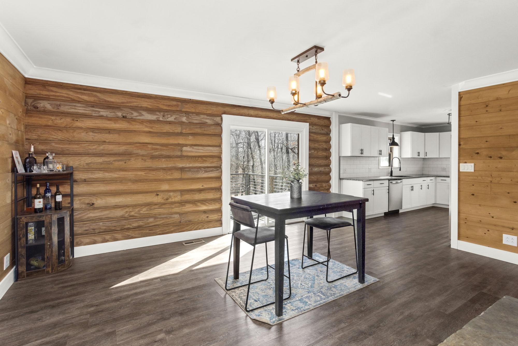 1300 Ridge Road Dickson, TN 37055 - Photo 22 of 60 a view of a dining room with furniture and wooden floor