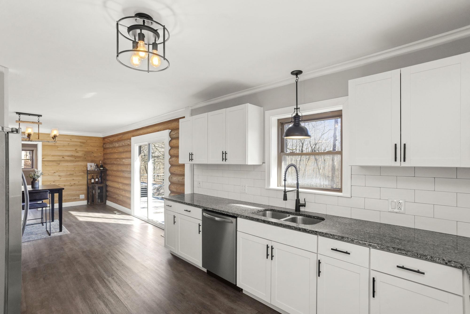 1300 Ridge Road Dickson, TN 37055 - Photo 25 of 60 a kitchen with a sink cabinets and window