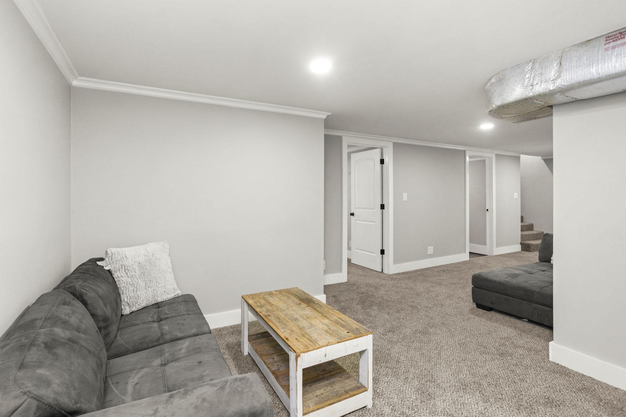 1300 Ridge Road Dickson, TN 37055 - Photo 31 of 60 a living room with furniture and a couch