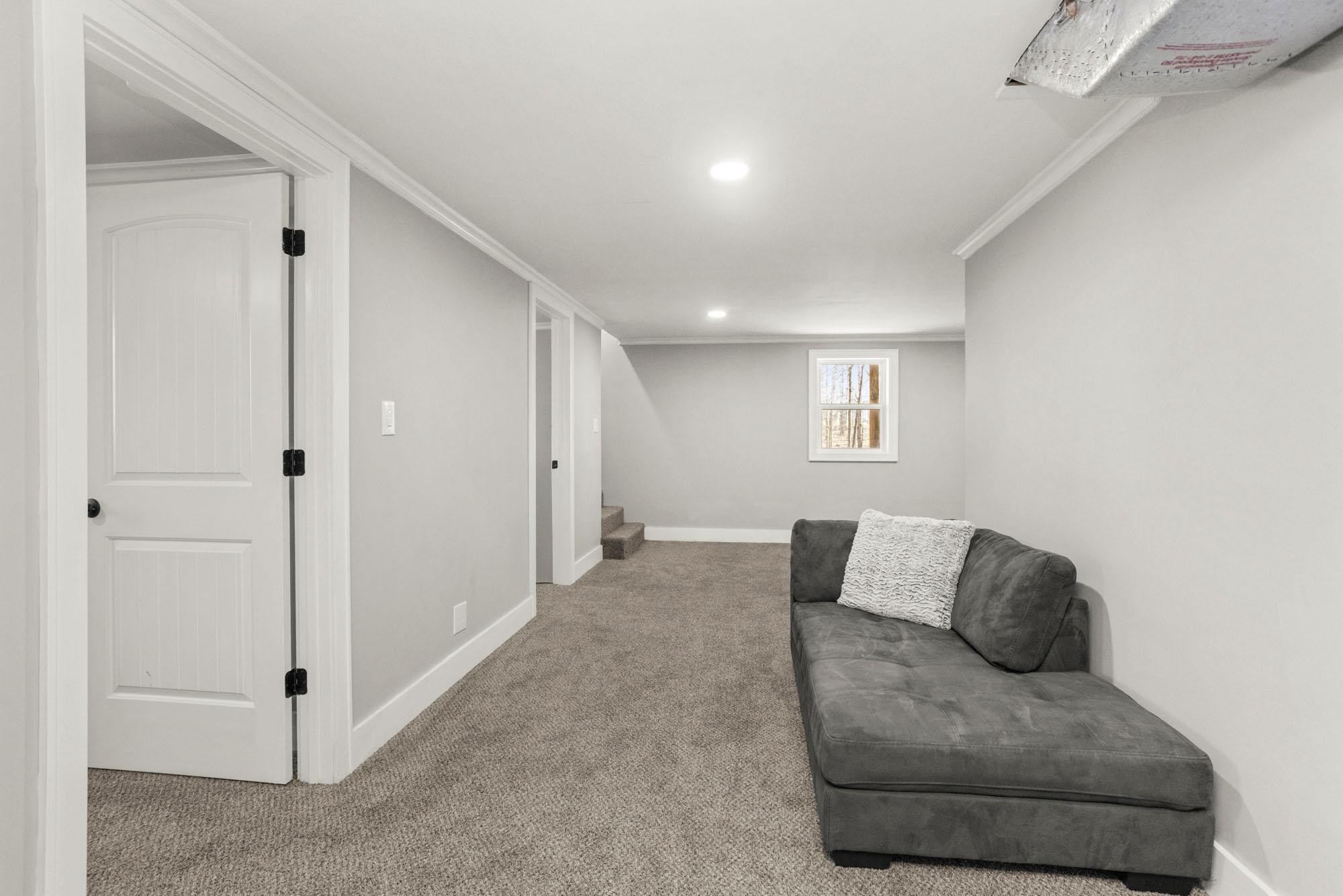 1300 Ridge Road Dickson, TN 37055 - Photo 32 of 60 a living room with furniture and a ceiling fan