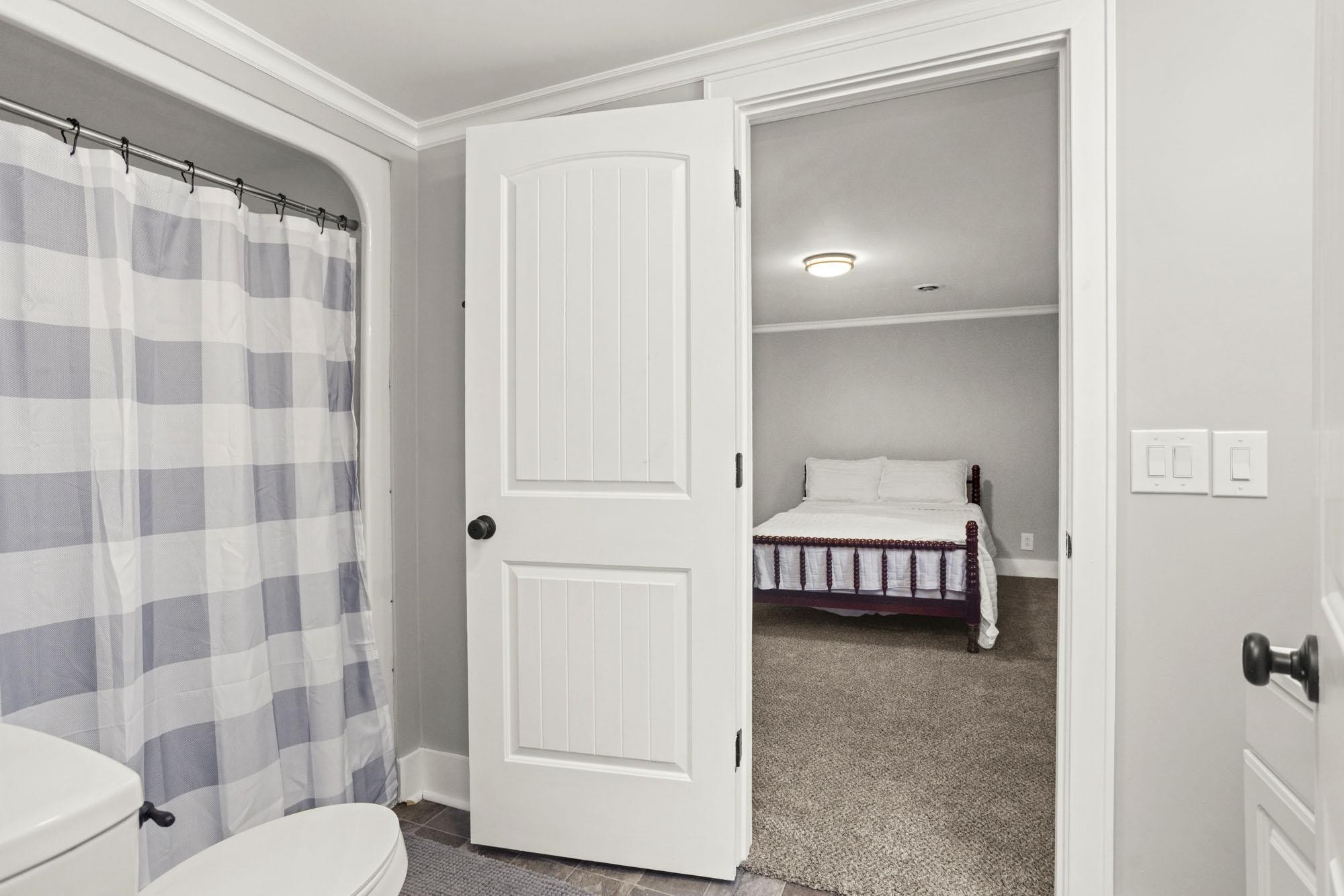 1300 Ridge Road Dickson, TN 37055 - Photo 37 of 60 a bathroom with a sink and a mirror
