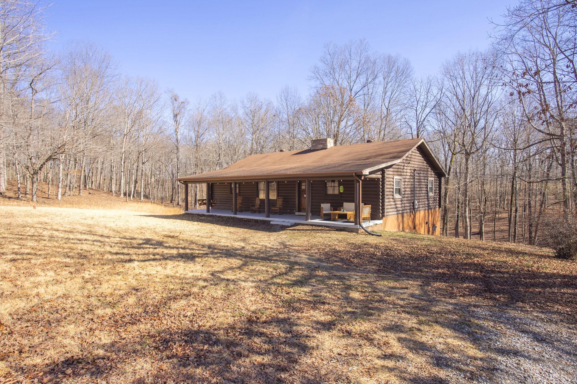1300 Ridge Road Dickson, TN 37055 - Photo 45 of 60 a front view of a house with a yard covered in snow