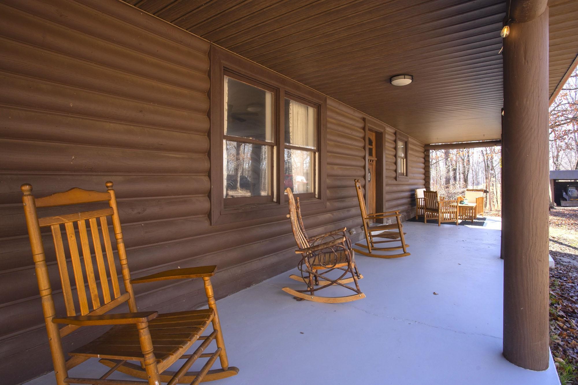 1300 Ridge Road Dickson, TN 37055 - Photo 5 of 60 a view of a patio with chairs and a table