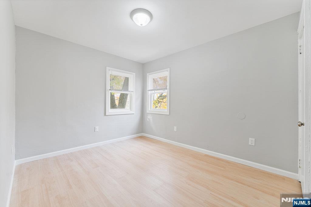 16 John Street, Unit 2 Lodi, NJ 07644 - Photo 14 of 32 an empty room with windows