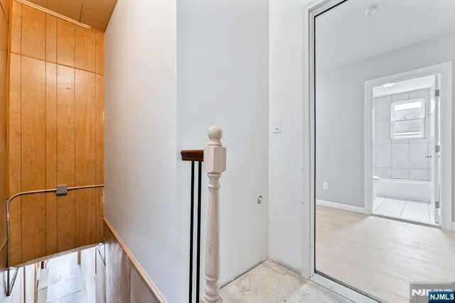 a view of a hallway with closet