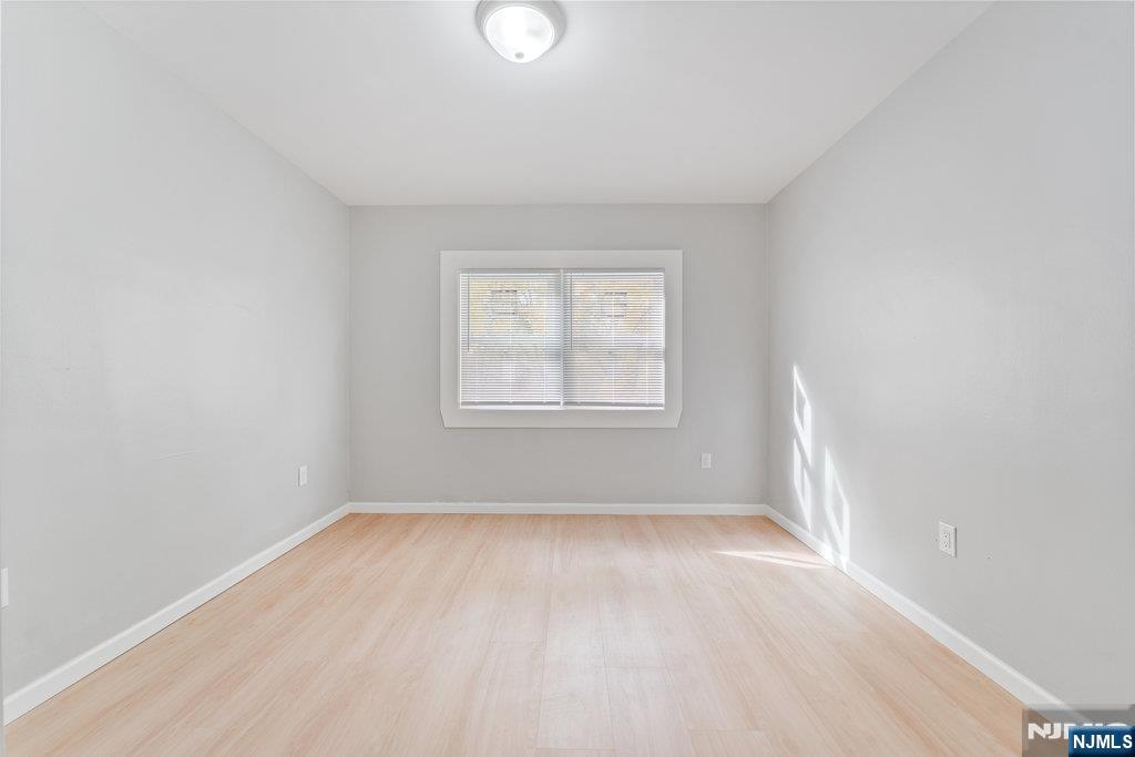 16 John Street, Unit 2 Lodi, NJ 07644 - Photo 9 of 32 an empty room with a window