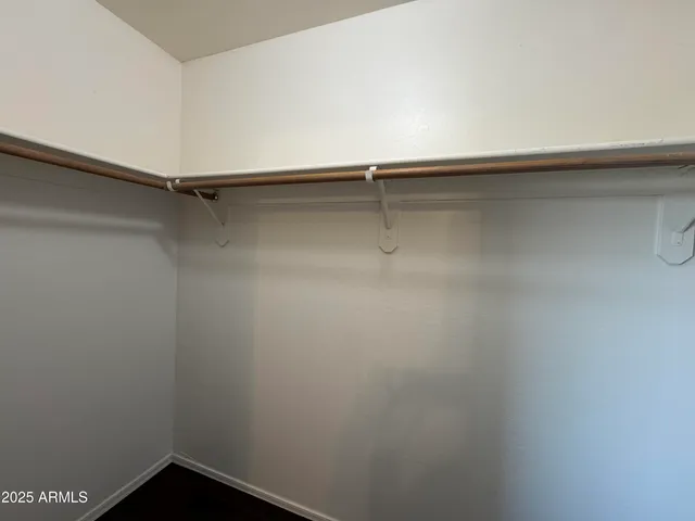 a view of an empty walk in closet