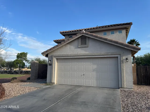 a white house with a outdoor space