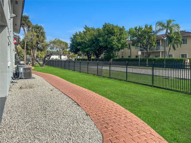 a view of a backyard with a garden