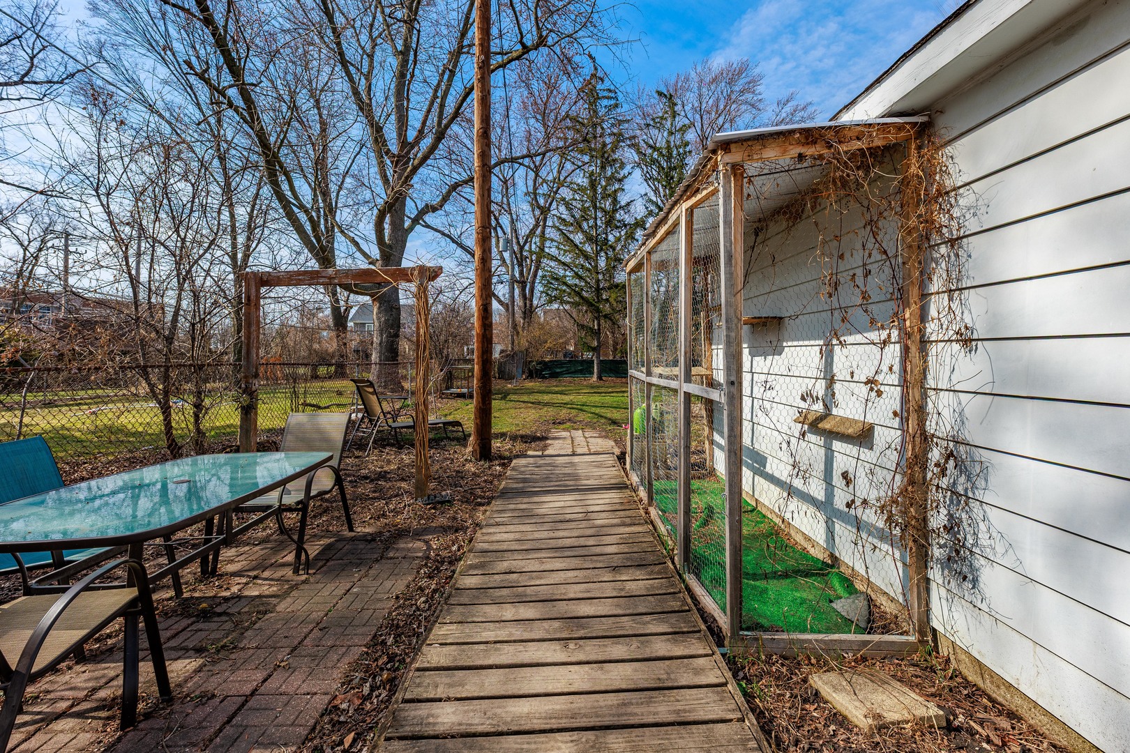 410 Repton Road Riverside, IL 60546 - Photo 28 of 30 a view of a pathway of a house with backyard