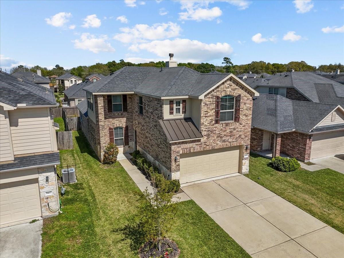 5111 Bay Lane Bacliff, TX 77518 - Photo 1 of 48 a front view of a house with a yard
