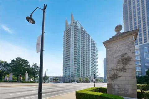 a view of a building with a street