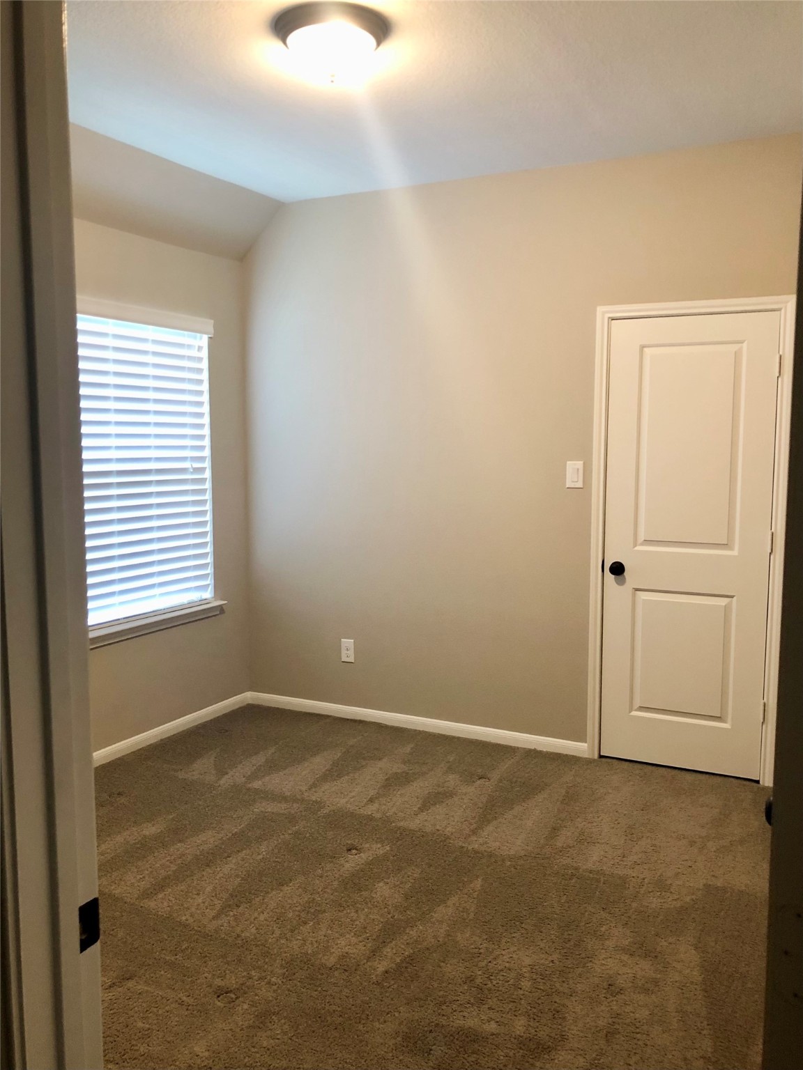 520 Pedernales Street Webster, TX 77598 - Photo 15 of 23 an empty room with windows