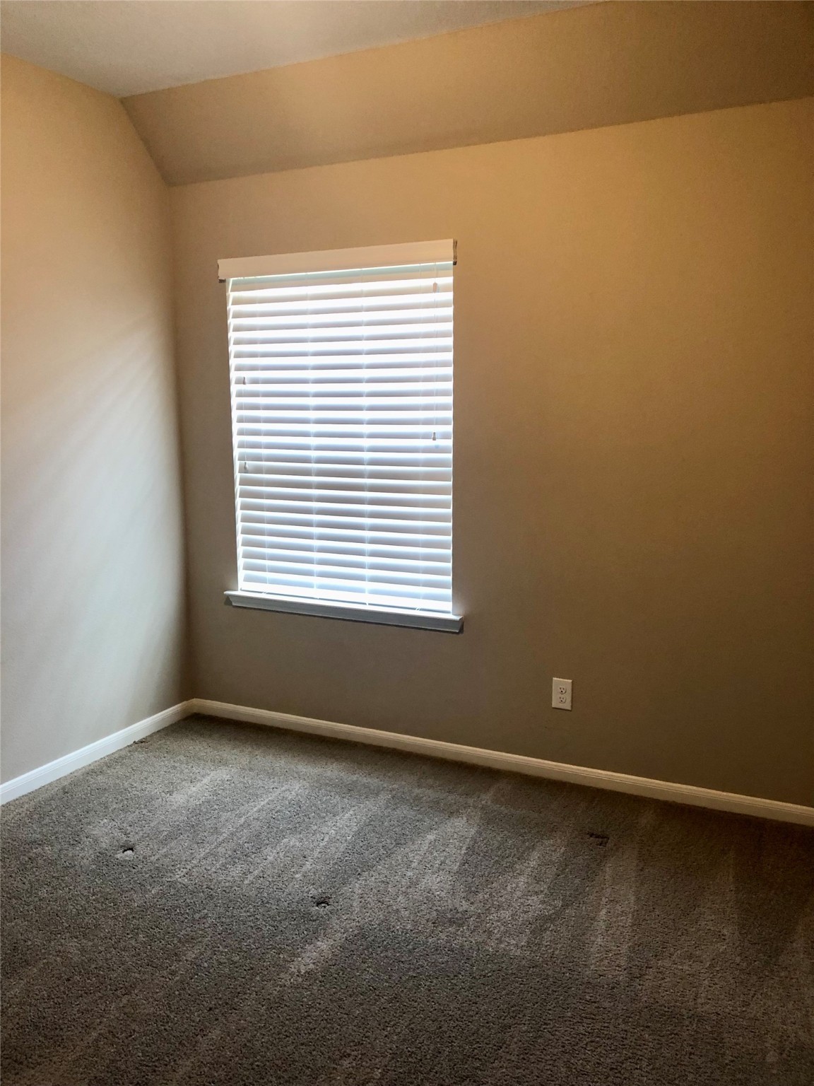 520 Pedernales Street Webster, TX 77598 - Photo 18 of 23 an empty room with a window