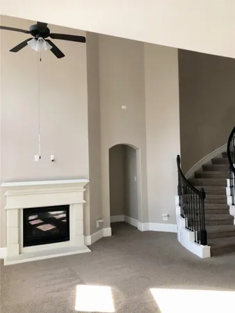 a view of a livingroom with a staircase