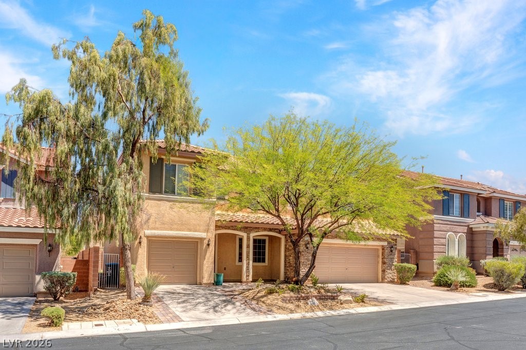 10336 Hawk Ravine Street Las Vegas, NV 89178 - Photo 57 of 59 This charming residence features a well-maintained exterior and inviting curb appeal.