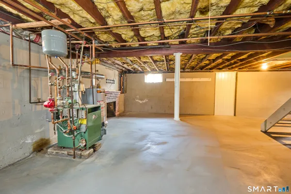a view of a house with a snow in the yard