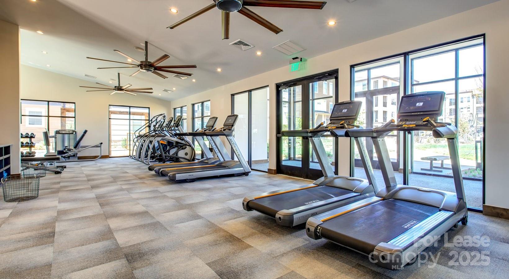6408 Providence Farm Lane, Unit B2 Charlotte, NC 28277 - Photo 12 of 44 a living room with lots of furniture and a large window