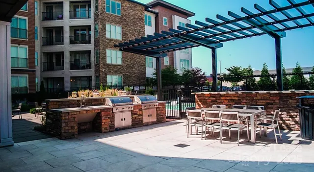 a view of kitchen and wooden floor